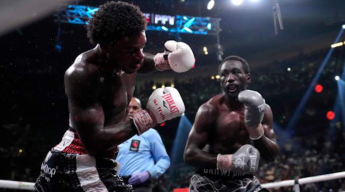 Terence Crawford and Errol Spence boxing.